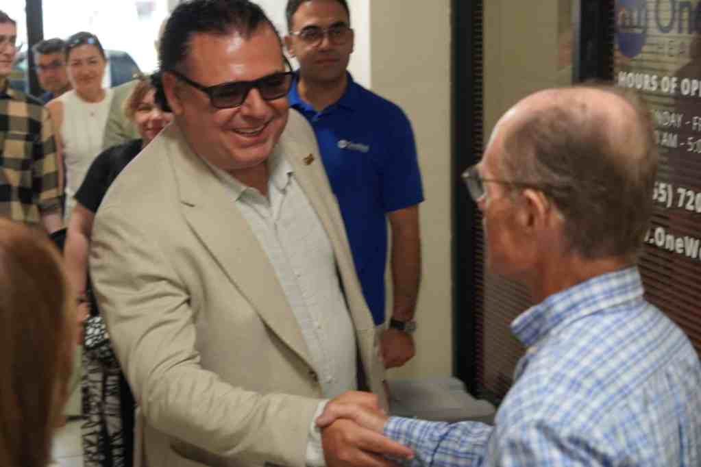 OneWell Health Care leadership greeting community members during the grand opening of its home care in El Centro office.